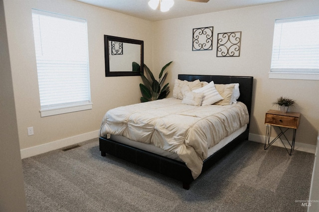 bedroom featuring ceiling fan and carpet floors