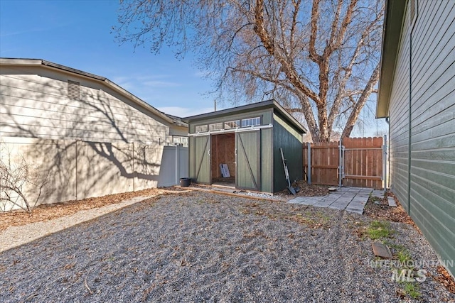 exterior space with fence and a gate