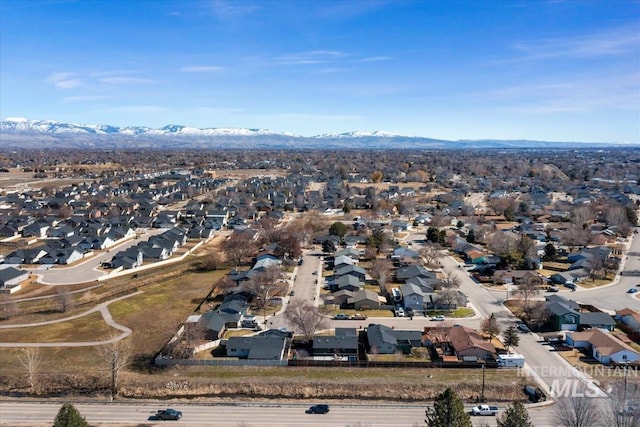 birds eye view of property featuring a residential view and a mountain view