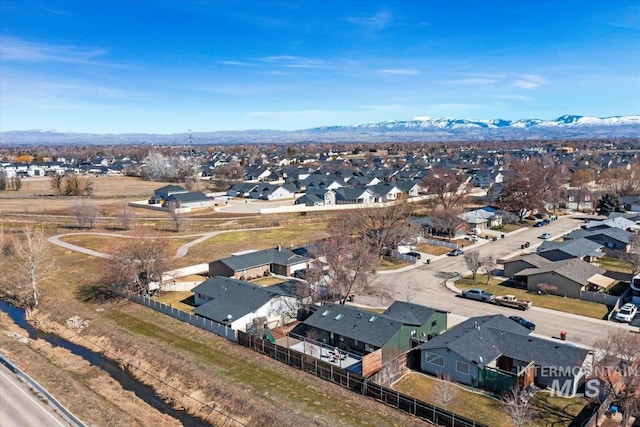 birds eye view of property with a residential view and a mountain view