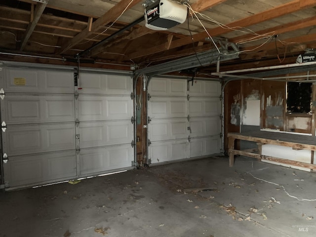 garage featuring a garage door opener