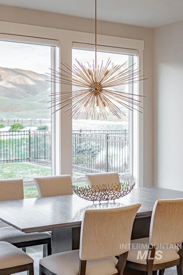 5946 E Barber Dr, Boise, ID 83716 - dining space featuring a notable chandelier