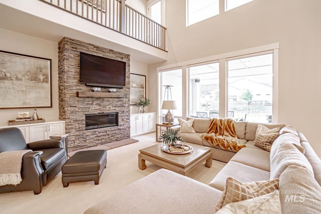 5946 E Barber Dr, Boise, ID 83716 - living area with light colored carpet, a towering ceiling, and a stone fireplace