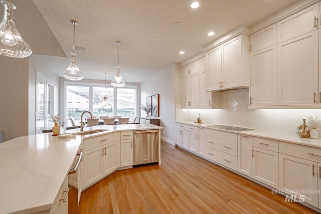 5946 E Barber Dr, Boise, ID 83716 - kitchen featuring recessed lighting, dishwasher, a sink, black electric stovetop, and light wood finished floors