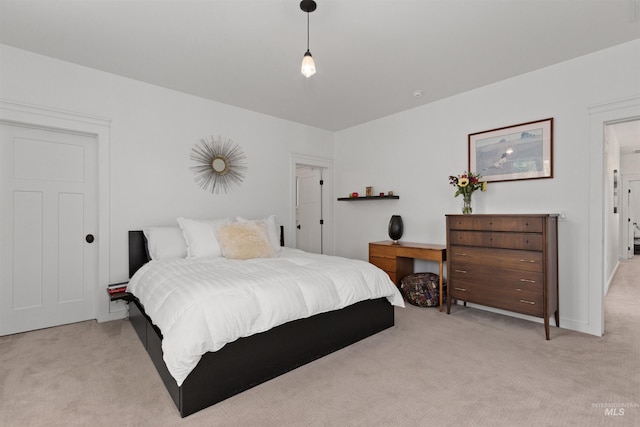 bedroom with light carpet