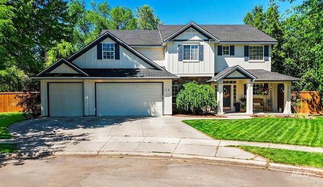 104 E Stonewater, Eagle, ID 83616 - view of front of property with driveway, a garage, board and batten siding, and roof with shingles