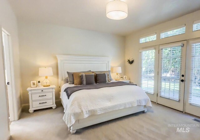 104 E Stonewater, Eagle, ID 83616 - bedroom with light carpet, access to outside, and french doors