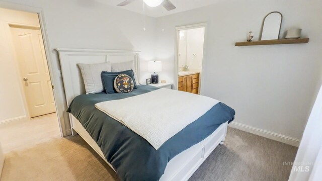 104 E Stonewater, Eagle, ID 83616 - bedroom featuring light colored carpet, connected bathroom, and a ceiling fan
