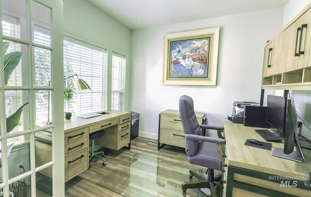 104 E Stonewater, Eagle, ID 83616 - office space featuring dark wood-style flooring and baseboards