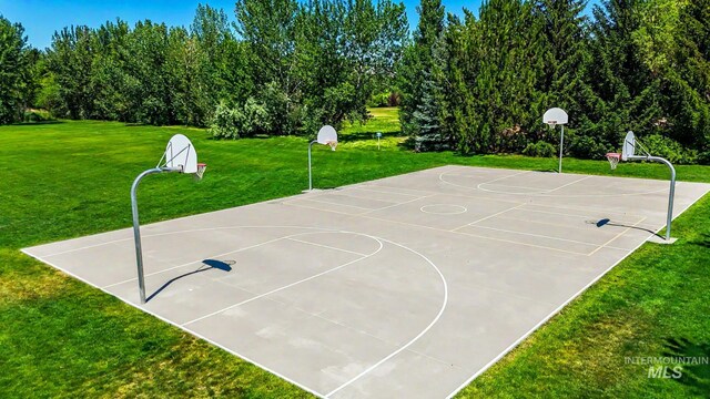104 E Stonewater, Eagle, ID 83616 - view of basketball court featuring community basketball court and a lawn