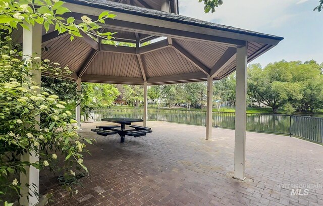 104 E Stonewater, Eagle, ID 83616 - view of property's community featuring a gazebo, a water view, and a patio