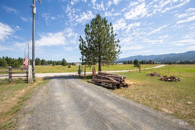 view of road with a mountain view and a rural view