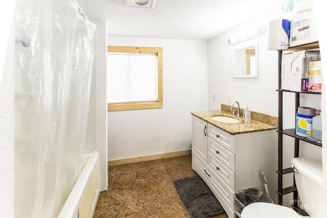 full bathroom with vanity, toilet, shower / bath combination with curtain, and a textured ceiling