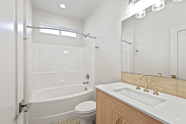 full bathroom featuring backsplash,  shower combination, toilet, vanity, and tile patterned floors