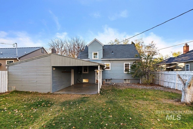 176 Taylor St, Twin Falls, ID 83301 - back of property featuring a patio and roof with shingles