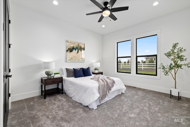 carpeted bedroom featuring ceiling fan