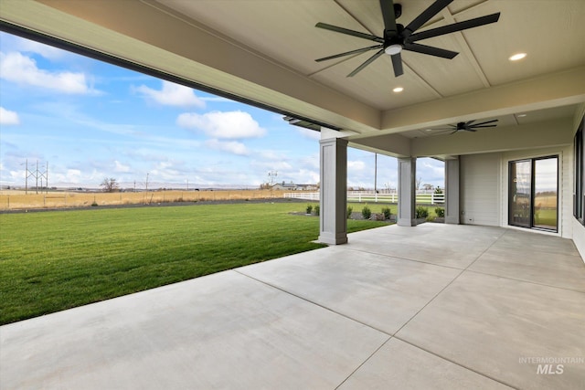 view of patio featuring ceiling fan