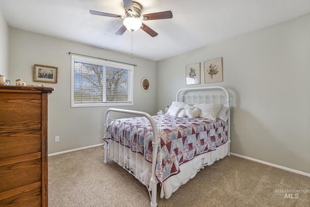 bedroom with light carpet and ceiling fan