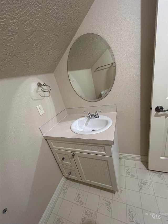 bathroom featuring vanity and tile patterned floors