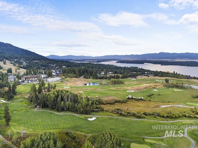 720 Village Dr Unit 404, Donnelly, ID 83615 - view of mountain background with a nearby body of water and a local golf course