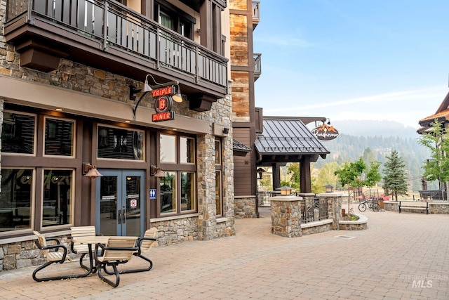 720 Village Dr Unit 404, Donnelly, ID 83615 - view of patio / terrace featuring a mountain view and a balcony