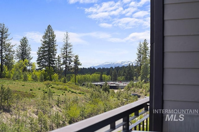720 Village Dr Unit 404, Donnelly, ID 83615 - balcony with a forest view and a mountain view