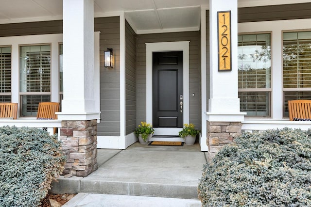 property entrance with a porch