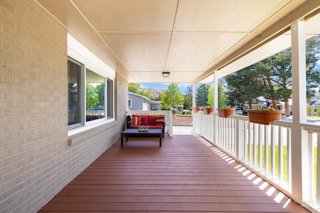 wooden deck featuring a porch