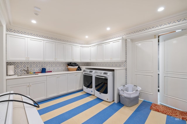 4305 Song Sparrow Ct, Mccall, ID 83638 - laundry area with washer and clothes dryer, cabinet space, ornamental molding, and light flooring