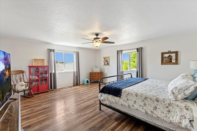 2175 W Willow Pointe Ave, Nampa, ID 83651 - bedroom with wood finished floors, a textured ceiling, and ceiling fan