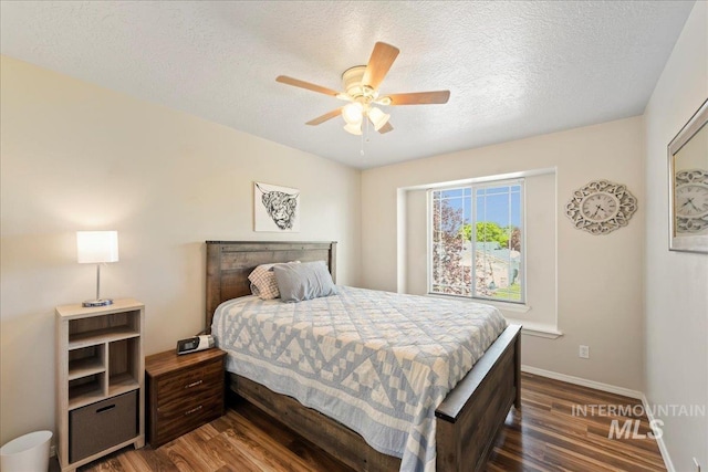 2175 W Willow Pointe Ave, Nampa, ID 83651 - bedroom featuring wood finished floors, baseboards, a textured ceiling, and a ceiling fan