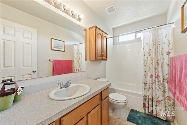 2175 W Willow Pointe Ave, Nampa, ID 83651 - full bathroom featuring toilet, vanity, and shower / bathtub combination with curtain