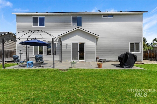 2175 W Willow Pointe Ave, Nampa, ID 83651 - rear view of house with a patio
