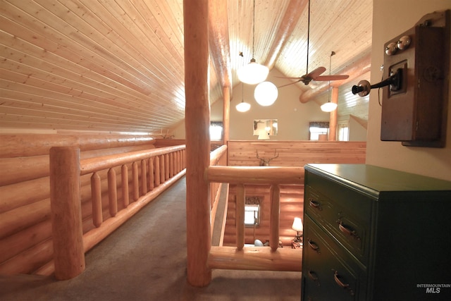 bonus room with ceiling fan, wood ceiling, rustic walls, and high vaulted ceiling