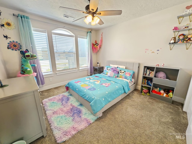 7063 S Pear Blossom, Meridian, ID 83642 - carpeted bedroom featuring ceiling fan and a textured ceiling