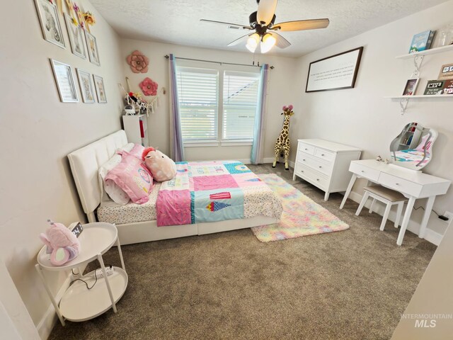 7063 S Pear Blossom, Meridian, ID 83642 - bedroom with ceiling fan, carpet flooring, and a textured ceiling
