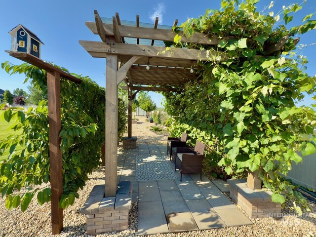 7063 S Pear Blossom, Meridian, ID 83642 - view of patio featuring a pergola
