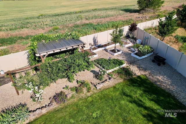 7063 S Pear Blossom, Meridian, ID 83642 - fenced backyard with a vegetable garden