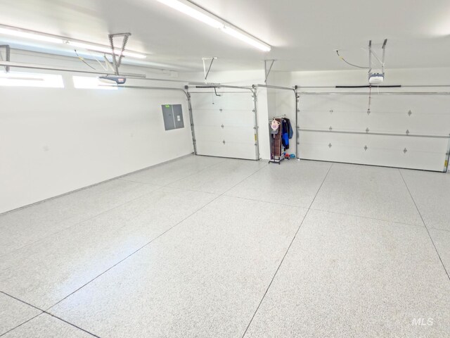7063 S Pear Blossom, Meridian, ID 83642 - garage with electric panel and a garage door opener