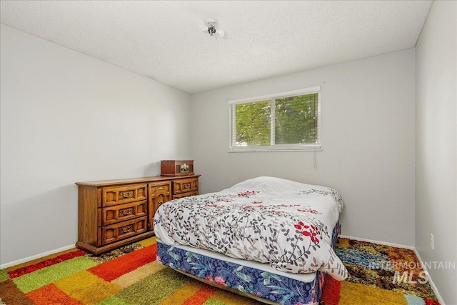 3600 S Robinson Blvd, Nampa, ID 83686 - bedroom with carpet floors and a textured ceiling