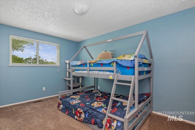 3600 S Robinson Blvd, Nampa, ID 83686 - bedroom with carpet floors and a textured ceiling