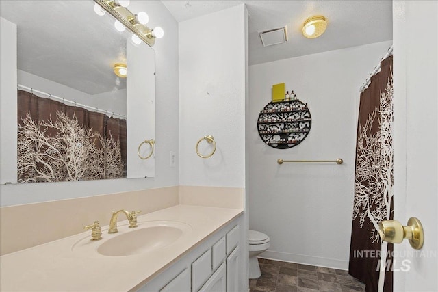 3600 S Robinson Blvd, Nampa, ID 83686 - full bathroom featuring vanity and toilet
