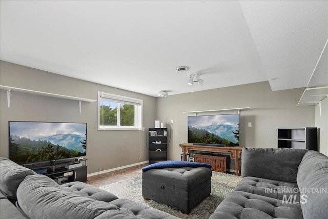 3600 S Robinson Blvd, Nampa, ID 83686 - living area with wood finished floors and baseboards