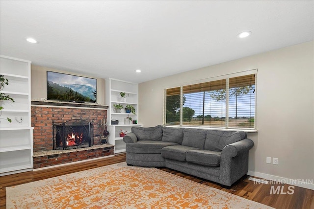 3600 S Robinson Blvd, Nampa, ID 83686 - living area featuring wood finished floors, a fireplace, and recessed lighting