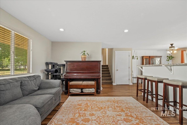 3600 S Robinson Blvd, Nampa, ID 83686 - living area with dark wood finished floors, recessed lighting, and stairs