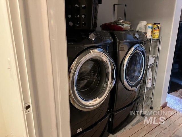 washroom featuring separate washer and dryer