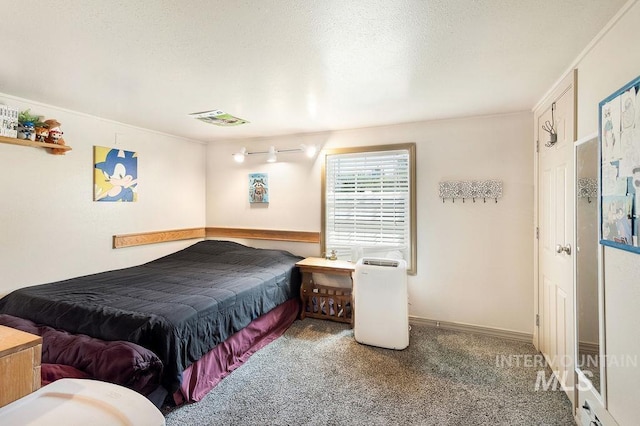 2500 W Orchard Ave, Nampa, ID 83651 - carpeted bedroom with visible vents, a textured ceiling, baseboards, and crown molding
