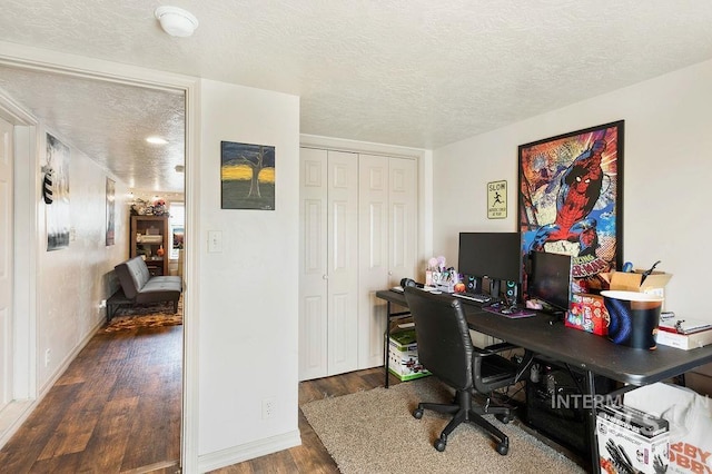 2500 W Orchard Ave, Nampa, ID 83651 - office area featuring baseboards, a textured ceiling, and wood finished floors