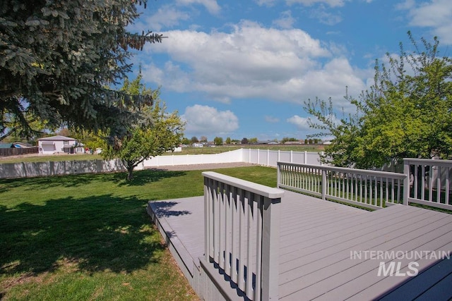 2500 W Orchard Ave, Nampa, ID 83651 - wooden terrace with a fenced backyard and a yard