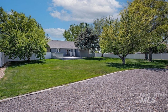 2500 W Orchard Ave, Nampa, ID 83651 - view of yard with a wooden deck and a fenced backyard